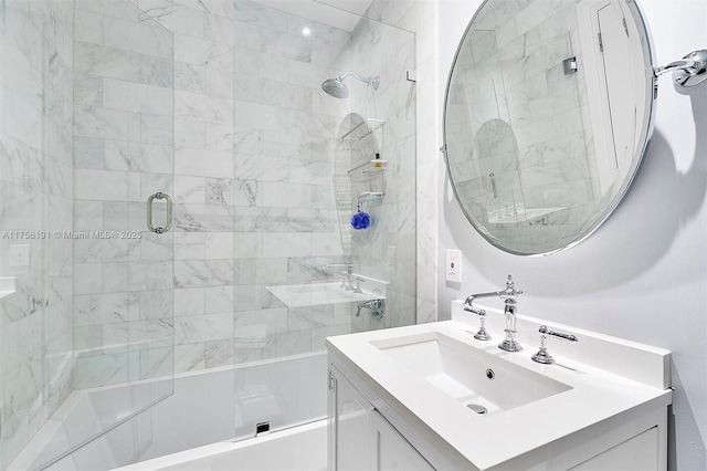 full bathroom featuring vanity and an enclosed shower