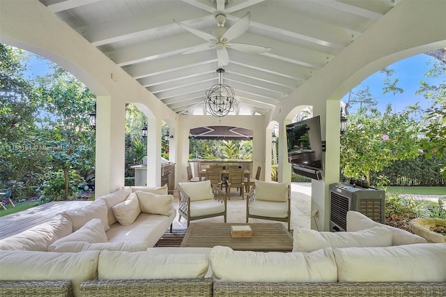 view of patio with an outdoor hangout area, area for grilling, and ceiling fan