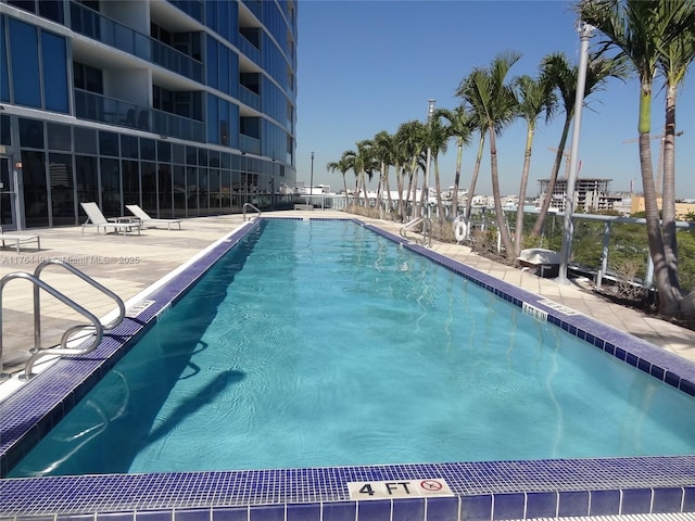 pool featuring a patio area