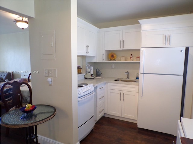 kitchen featuring a sink, light countertops, electric panel, white appliances, and open shelves