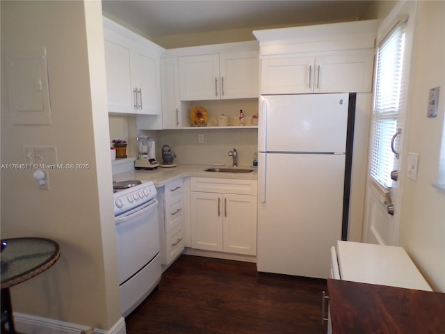 kitchen with dark wood-type flooring, a sink, open shelves, white cabinetry, and white appliances