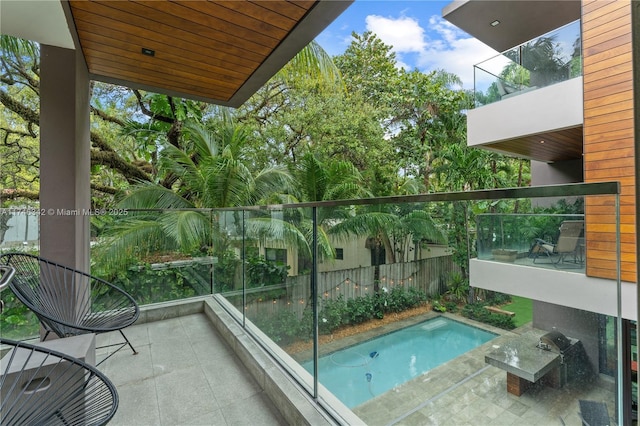 balcony featuring a jacuzzi