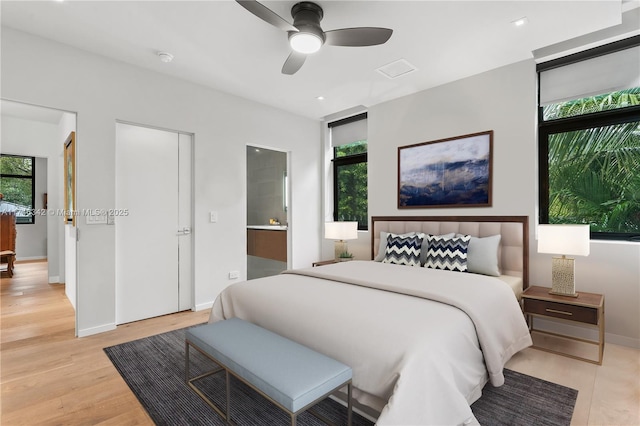 2803 Crystal Ct, Coconut Grove, FL 33133 - bedroom with light wood-style flooring, baseboards, and ceiling fan