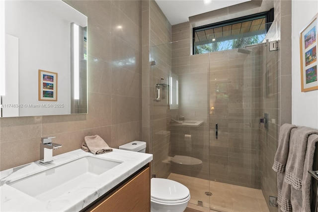 2803 Crystal Ct, Coconut Grove, FL 33133 - bathroom with toilet, a shower stall, tile walls, and vanity
