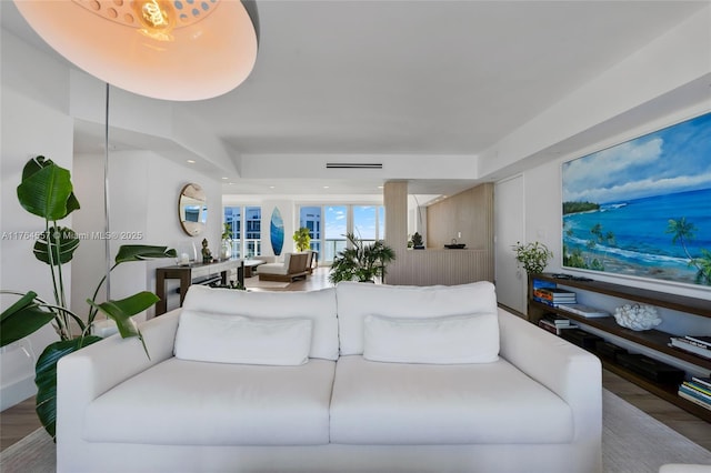 living room featuring recessed lighting and wood finished floors