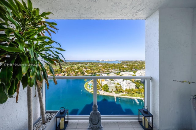 view of pool featuring a water view