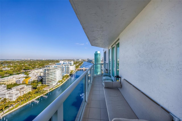 balcony with a city view and a water view