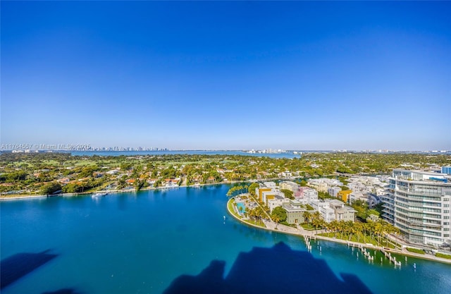 drone / aerial view with a water view