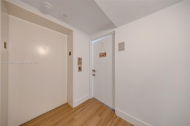 hallway featuring light wood-style floors