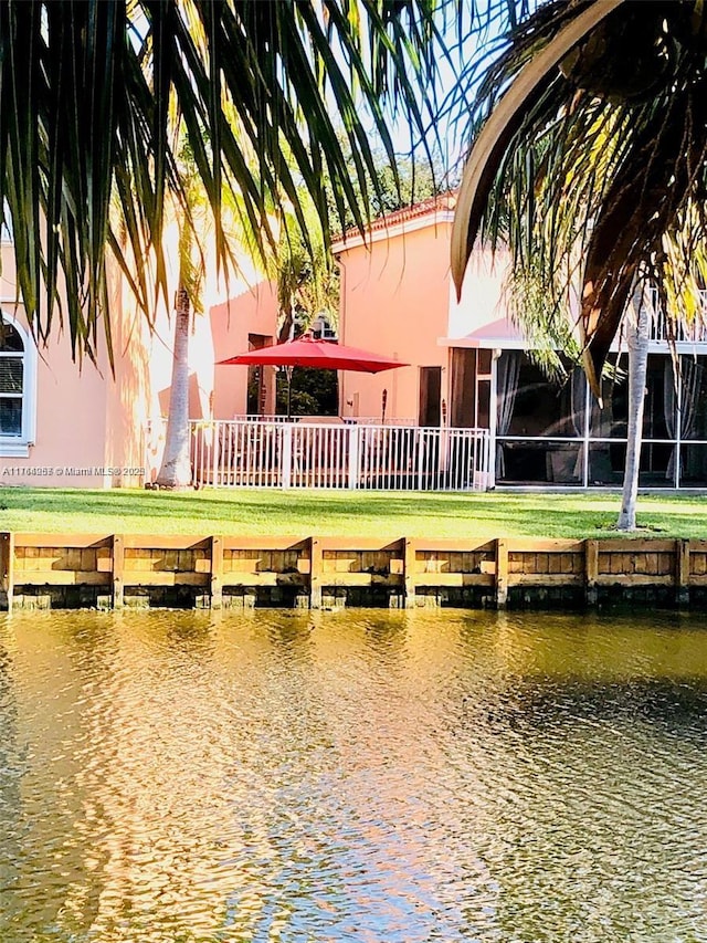 dock area featuring a water view