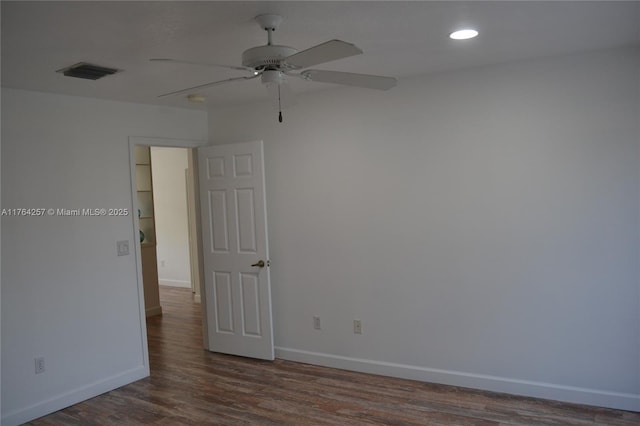 unfurnished room with visible vents, wood finished floors, recessed lighting, baseboards, and ceiling fan