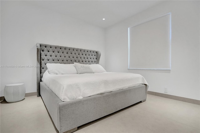 bedroom with recessed lighting and baseboards