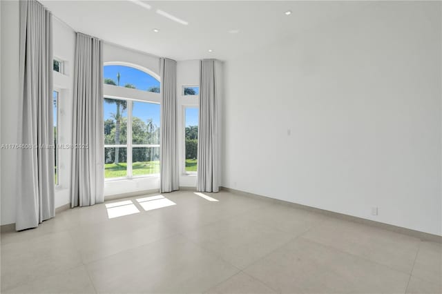 3234 SW 53rd Ct, Hollywood, FL 33312 - empty room with baseboards and recessed lighting