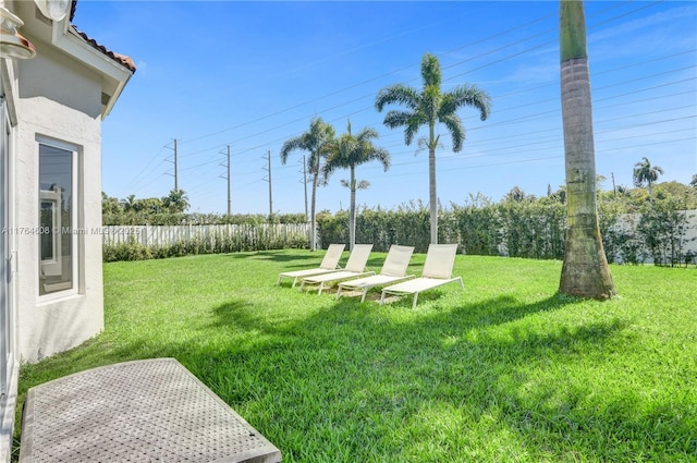 view of yard featuring fence