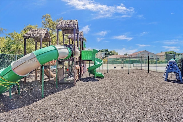 community jungle gym featuring fence