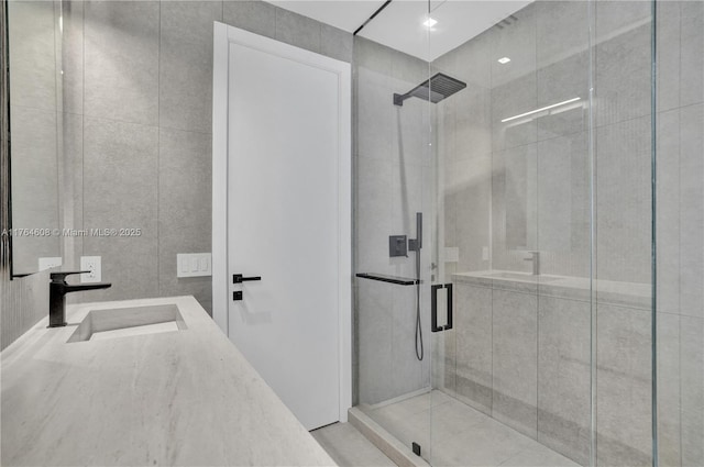 3234 SW 53rd Ct, Hollywood, FL 33312 - bathroom with a shower stall, tile walls, and vanity