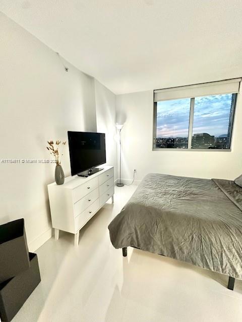 bedroom with baseboards