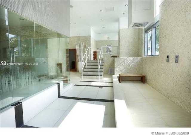 bathroom with tile patterned floors and visible vents