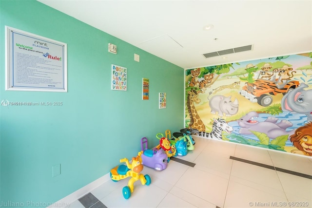 playroom featuring tile patterned floors and visible vents