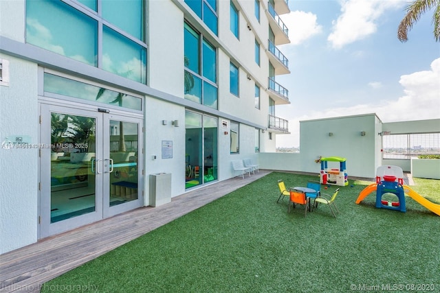 exterior space featuring french doors and wood finished floors