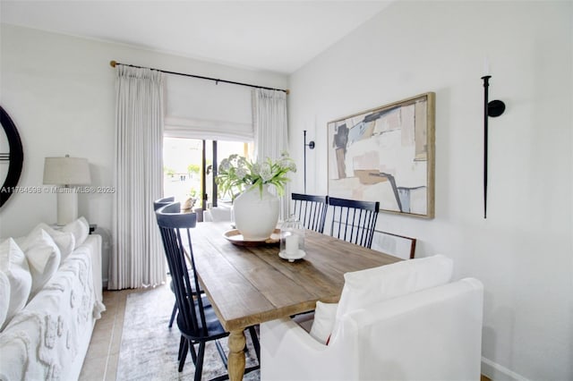 dining room featuring light tile patterned floors