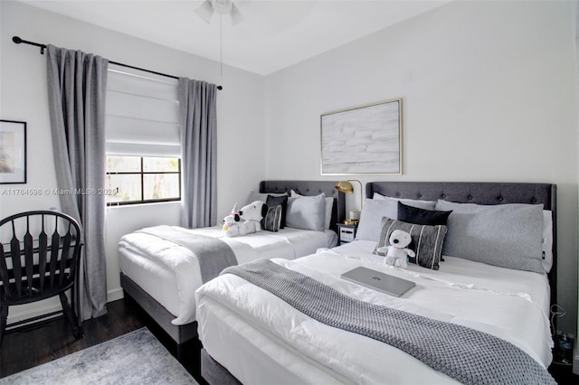 bedroom featuring wood finished floors