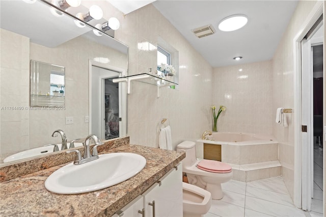 full bath with visible vents, toilet, a bidet, tile walls, and a bath