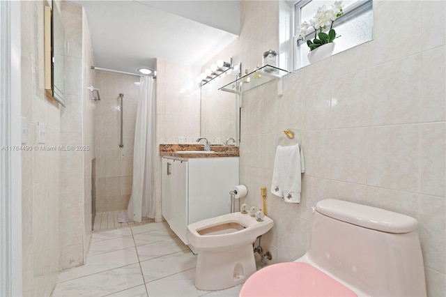 bathroom with tiled shower, toilet, tile walls, and vanity