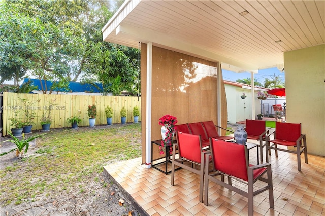 view of patio with fence