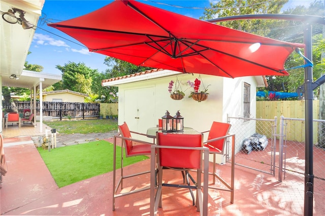 view of patio / terrace with fence