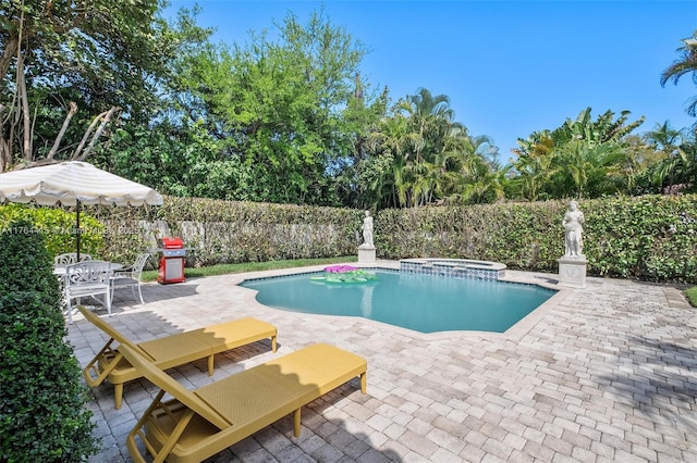 view of pool featuring a patio area, outdoor dining space, a pool with connected hot tub, and fence