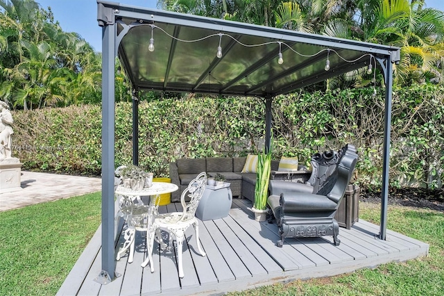 wooden terrace featuring outdoor lounge area