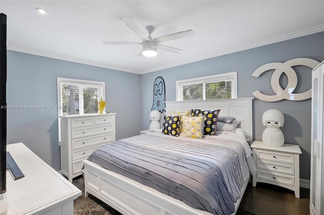 bedroom with dark wood finished floors, a ceiling fan, and ornamental molding