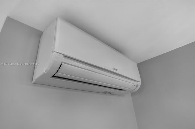 interior details featuring a wall mounted AC