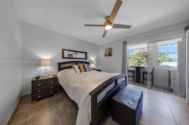 bedroom with tile patterned flooring, a ceiling fan, and baseboards