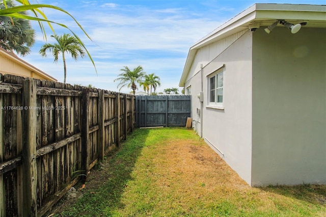 view of yard featuring a fenced backyard