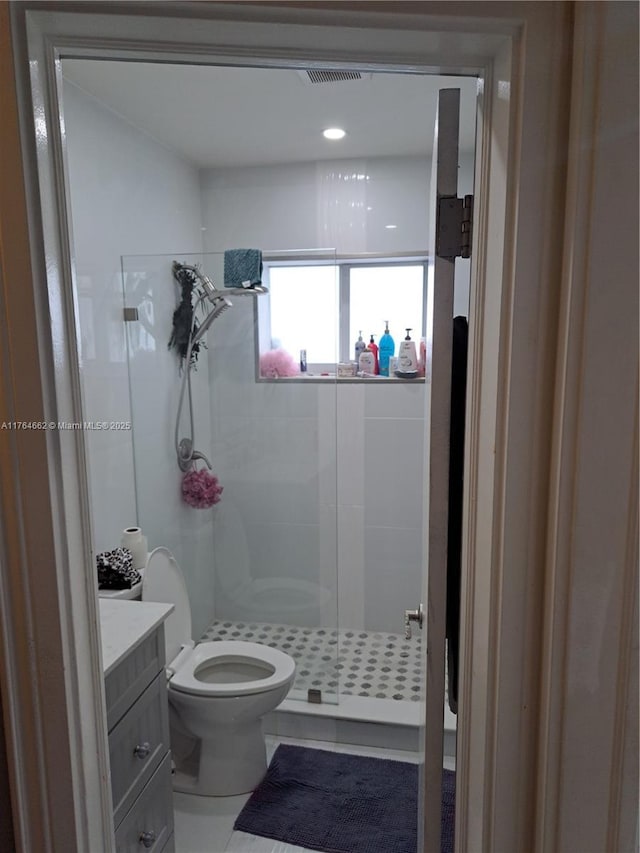 911 W Country Club Cir, Plantation, FL 33317 - full bath featuring visible vents, toilet, a stall shower, tile patterned flooring, and vanity