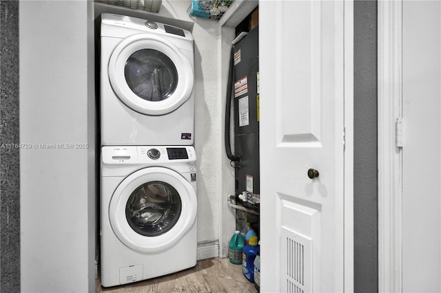 13021 NW 11th Ter, Miami, FL 33182 - laundry area with a textured wall, laundry area, and stacked washing maching and dryer