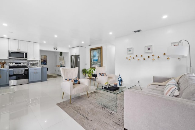 10341 SW 150th Ter, Miami, FL 33176 - living area featuring light tile patterned flooring, visible vents, recessed lighting, and a toaster
