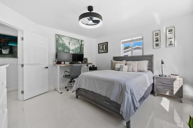 10341 SW 150th Ter, Miami, FL 33176 - bedroom featuring light tile patterned floors and baseboards