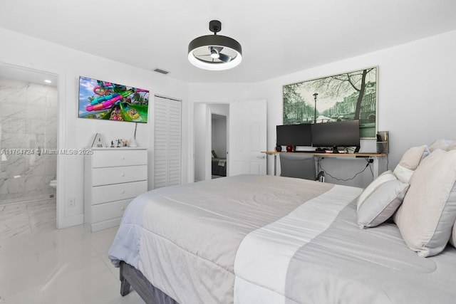 10341 SW 150th Ter, Miami, FL 33176 - bedroom with visible vents, marble finish floor, and connected bathroom