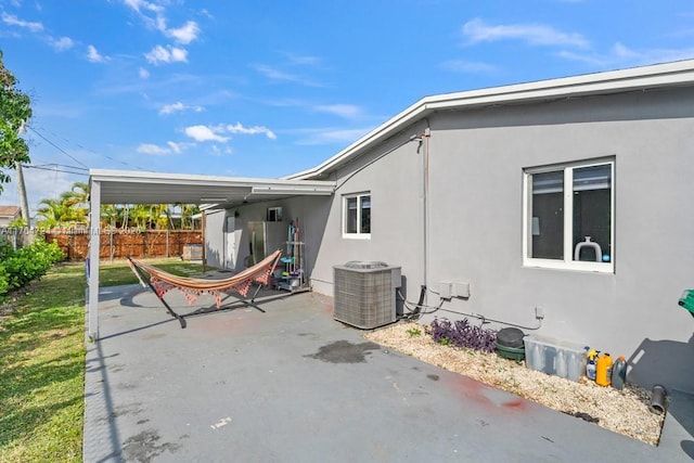 10341 SW 150th Ter, Miami, FL 33176 - view of patio with central air condition unit and fence