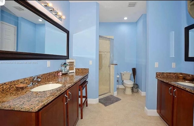 1020 NW Leonardo Cir, Port St Lucie, FL 34986 - bathroom featuring a sink, visible vents, toilet, and a shower stall