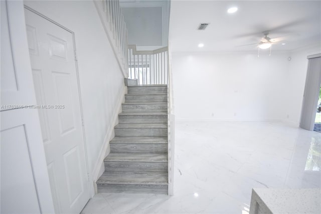 stairway featuring visible vents, baseboards, ceiling fan, recessed lighting, and marble finish floor