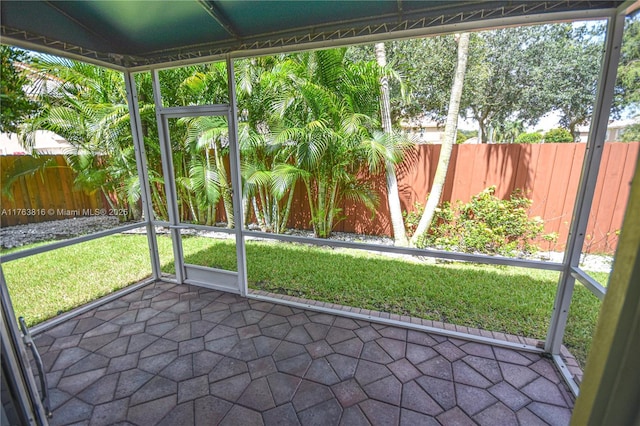 unfurnished sunroom with a healthy amount of sunlight