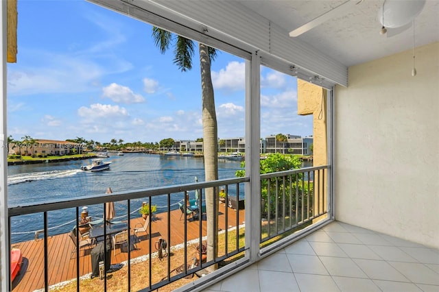 balcony featuring a water view