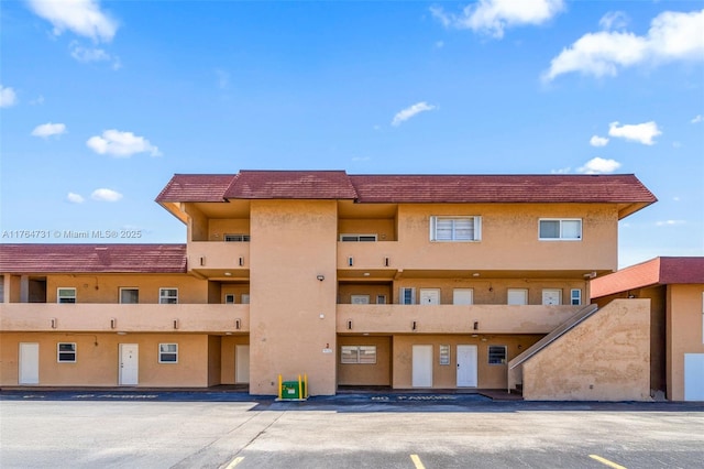 9952 SW 88th St Unit 9952, Miami, FL 33176 - view of apartment building / complex with uncovered parking