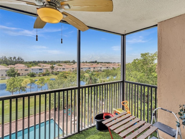 900 NE 195th St Unit 504, Miami, FL 33179 - balcony with a ceiling fan and a residential view