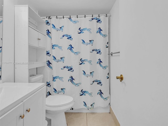900 NE 195th St Unit 504, Miami, FL 33179 - bathroom with toilet, vanity, and tile patterned flooring