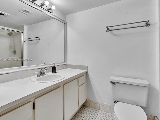 900 NE 195th St Unit 504, Miami, FL 33179 - bathroom with tile patterned floors, a shower with shower door, toilet, and visible vents